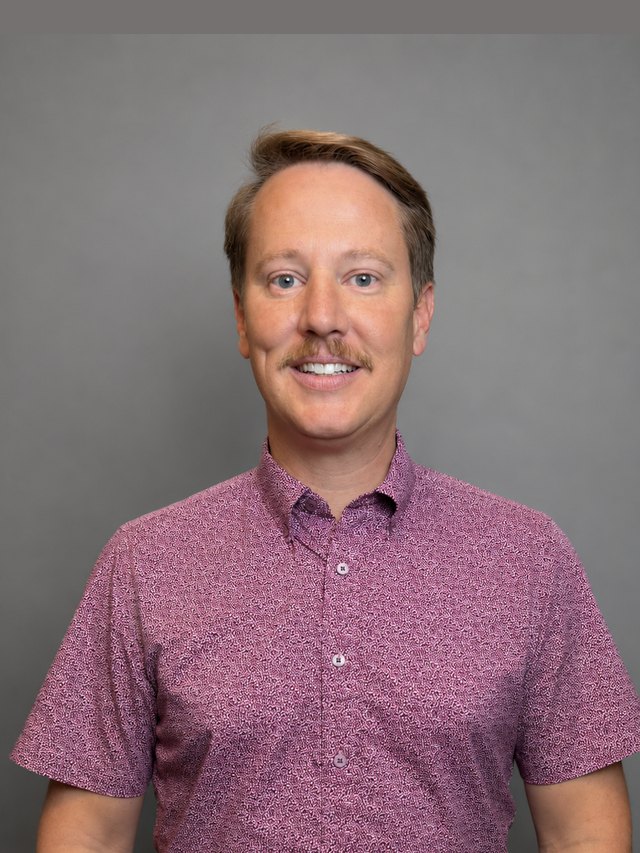 Kevin Tomlinson, President
